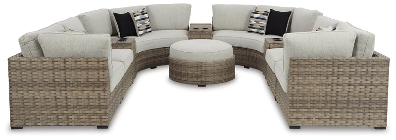 Calworth Beige Outdoor 9-Piece Sectional With Ottoman