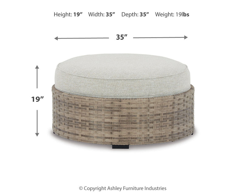 Calworth Beige Outdoor Ottoman With Cushion